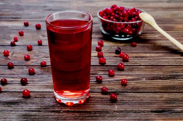 cranberry juice glass with fresh cranberries